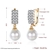 Picture of Main Products Platinum Plated Venetian Pearl Huggies Earrings