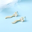 Show details for Delicate Small White Stud Earrings