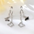 Picture of Butterfly Platinum Plated Dangle Earrings Online Only
