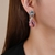 Picture of Copper or Brass Pink Dangle Earrings in Exclusive Design