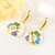 Picture of Designer Gold Plated White Dangle Earrings with No-Risk Return